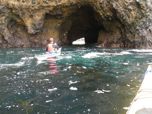 Taylor exploring a sea cave.